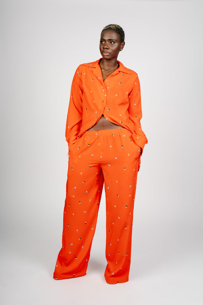 Model Akou wearing lalla bee everyday shirt and relaxed pants