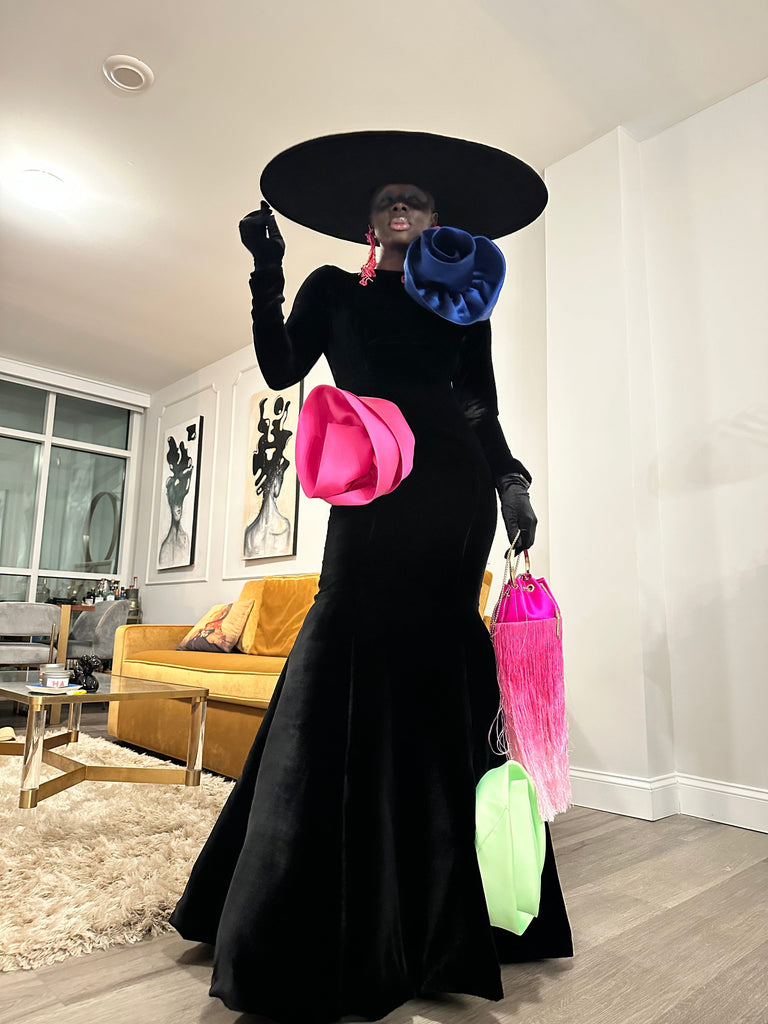 bold skin babe Akou wearing a velvet black one of a kind luxury gown by lalla bee