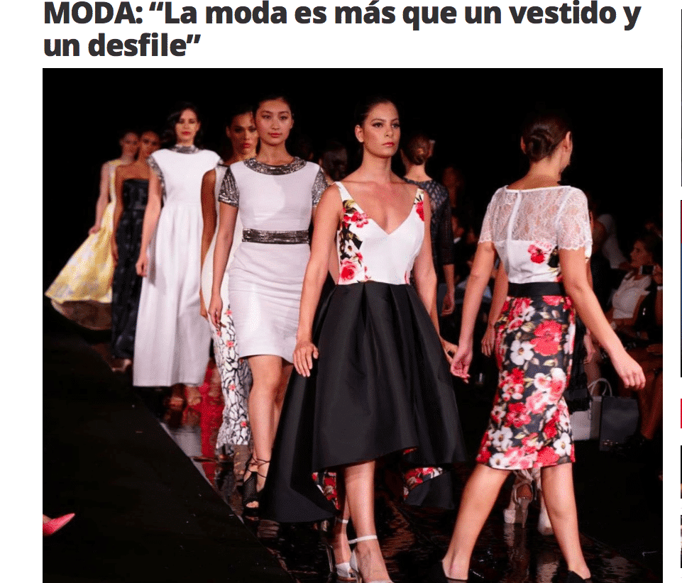 Models walking the runway in Lalla Bee floral and modern dresses during a fashion show.