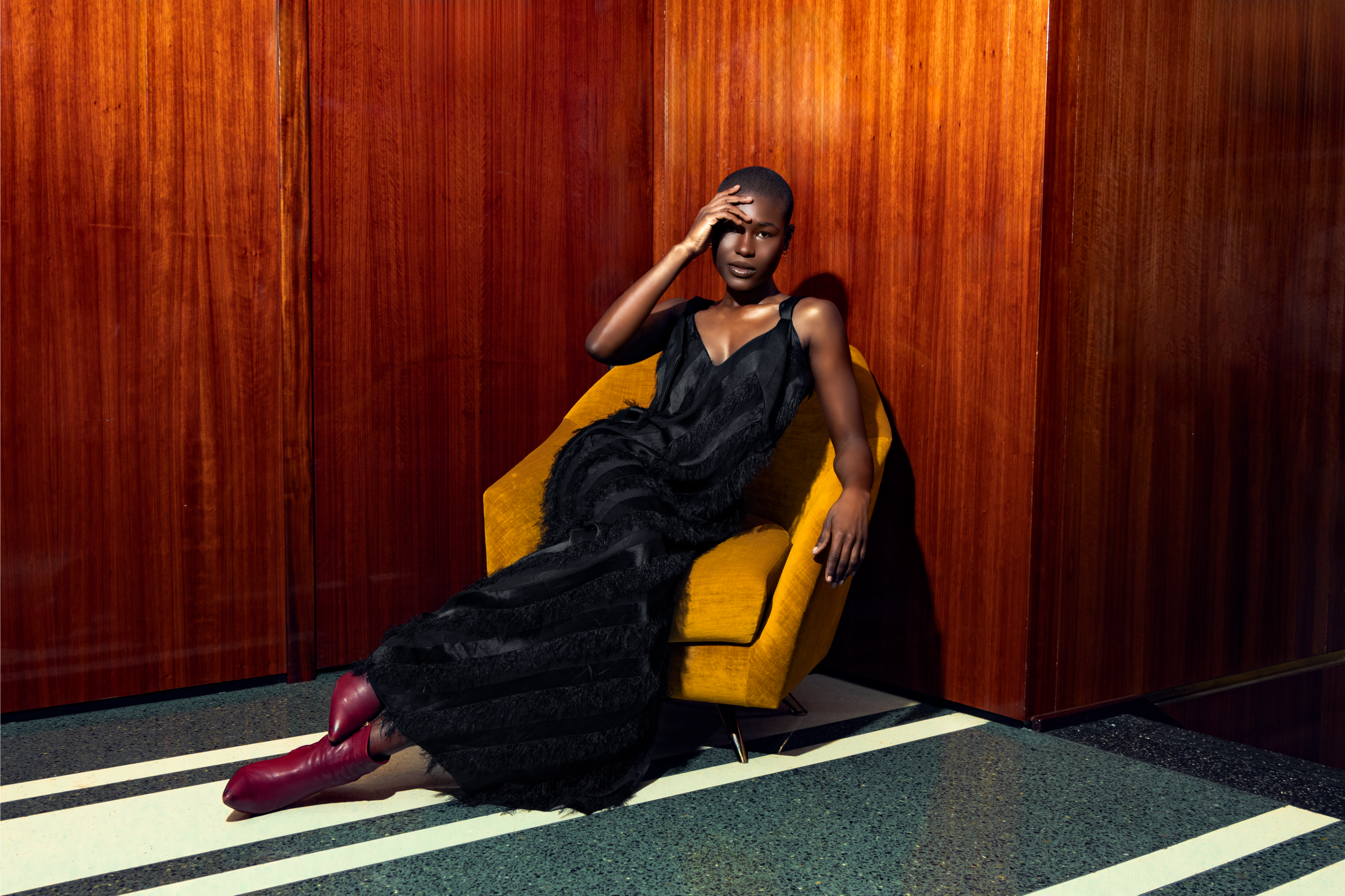Designer Melina Cortes-Nmili with models and guests wearing Lalla Bee luxury gowns during a fashion event, celebrating diversity and elegance.