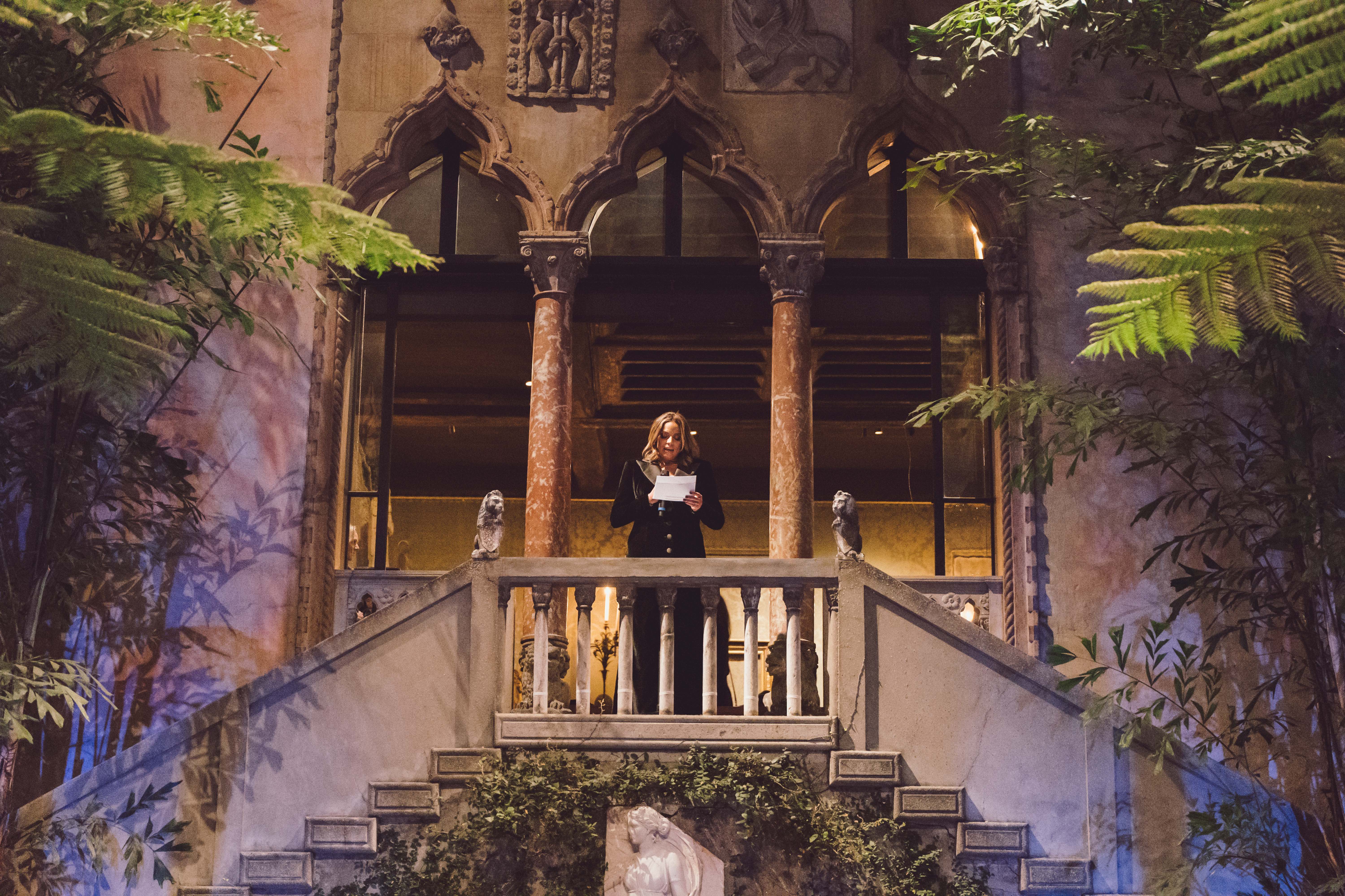 Melina Cortes-Nmili giving a speech at the Velvet Party